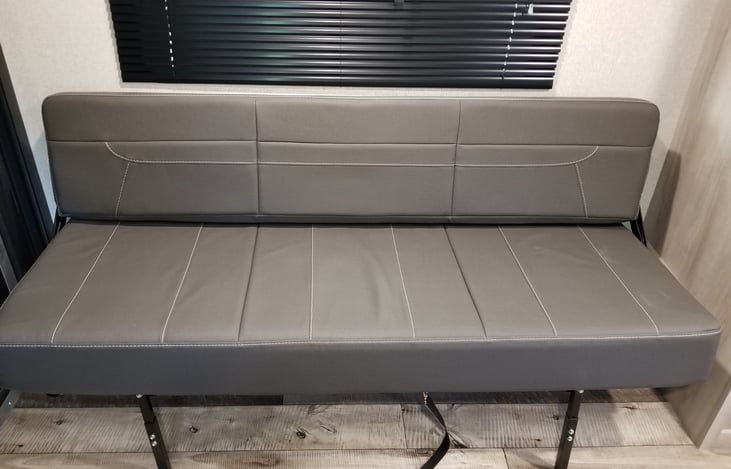 Serves also as a bench with dining table.