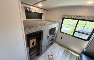 The ⁠Keystone Outback 340BH luxury travel trailer