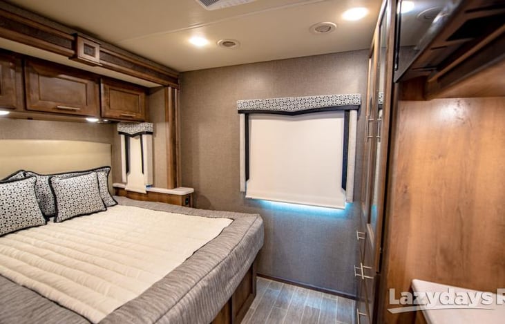 Master bedroom, queen sized bed, bed is accessible with slide pulled in (some motorhomes do not have an accessible bed with slides in)