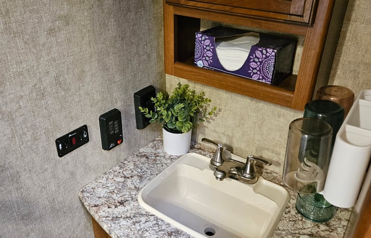 Sink outside of bathroom.