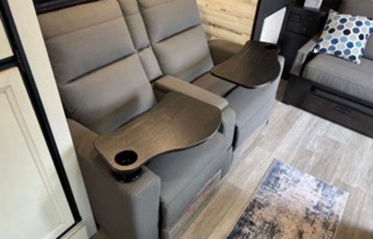 Recliners with swing tables for eating