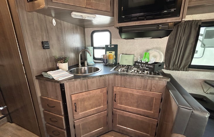 Kitchen: Microwave, Stove, Sink & Countertop