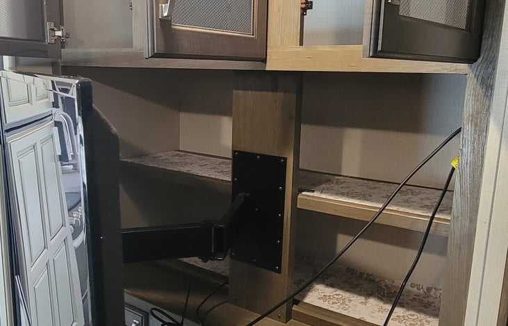Storage behind TV