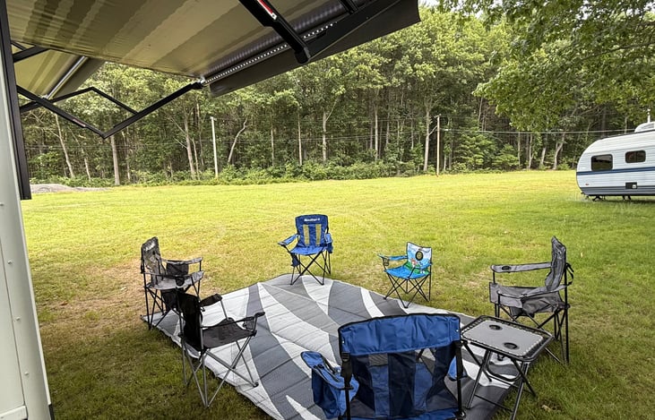 7 Chairs and rug provided