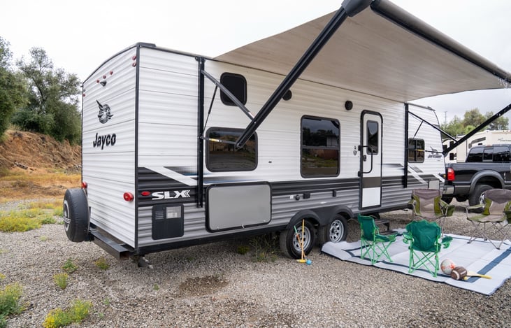 Large exterior storage houses outdoor games, a 4' table, 4 camping chairs and an outdoor mat for your use.  Plenty of room to bring your own cooler (or add one to your reservation).