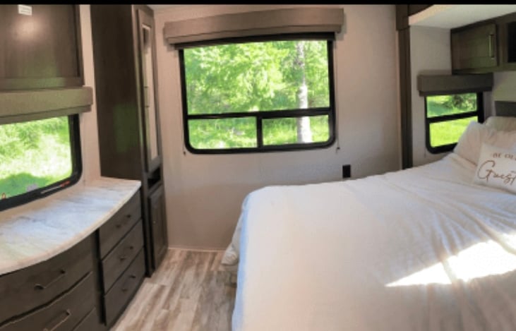 Rear master bedroom with queen bed. Lot’s of privacy in the back room.