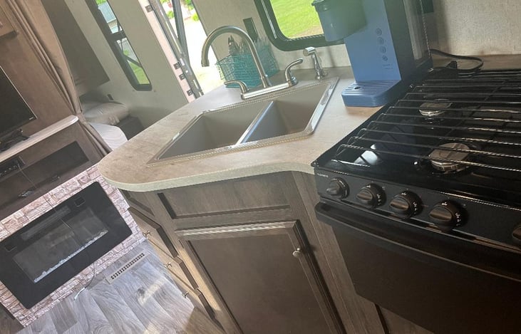 Full Functioning Kitchen and you can see the fireplace