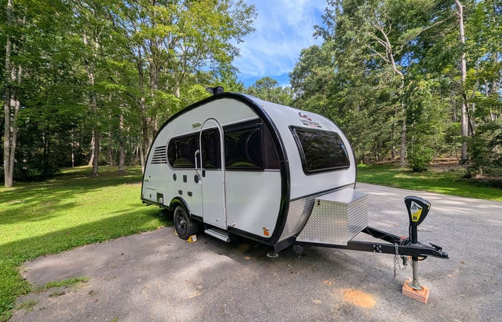 Rugged, cozy and classy, this easy-to-tow 2021 Little Guy Max is loaded with features and accommodations including Rough Rider package, solar, solid wood cabinetry, Queen bed, pop-out windows & more.