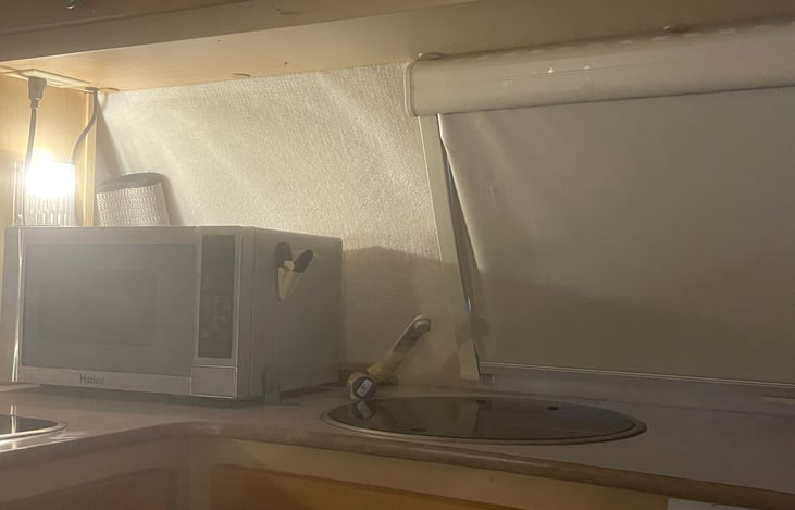 Sink and front window with shade down