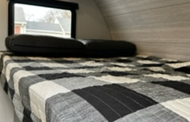 Comfy queen size bed to rest after a full day of activities.