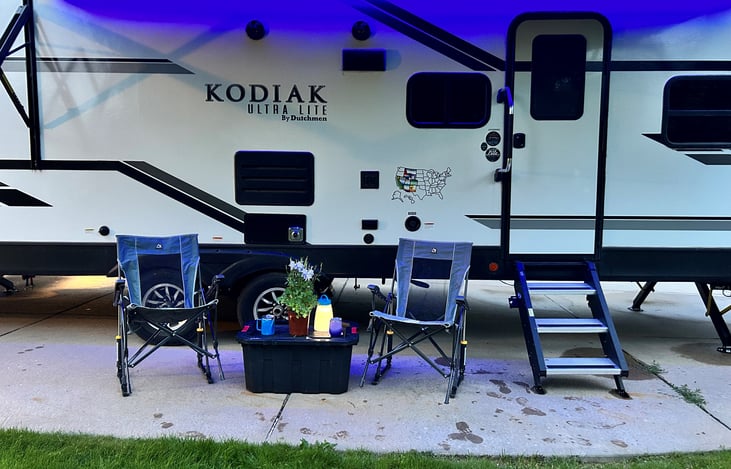 Up to 4 rocker camping chairs and lanterns included