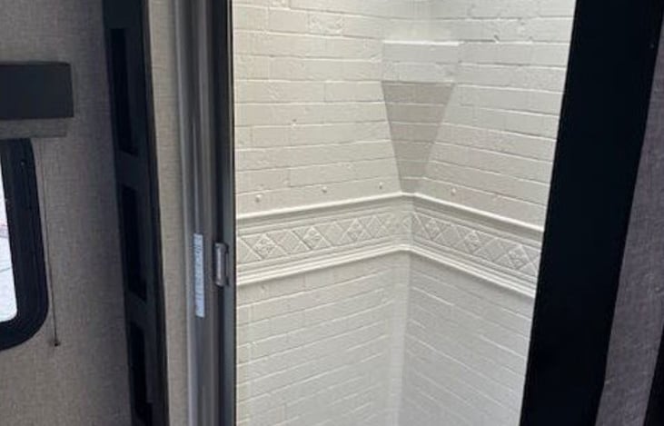 Bathroom: Roomy shower for a comfortable rinse after a long day.