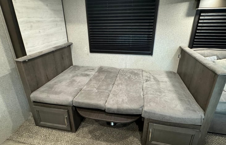 This is the dining table/ bed also for either 1 or 2 people can sleep on it.