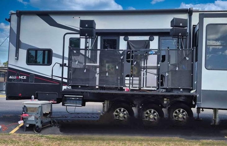 Perfect for the D.J. or  Master of Ceremony to oversee the event!  How many Rvs do you get a ready-made stage with?