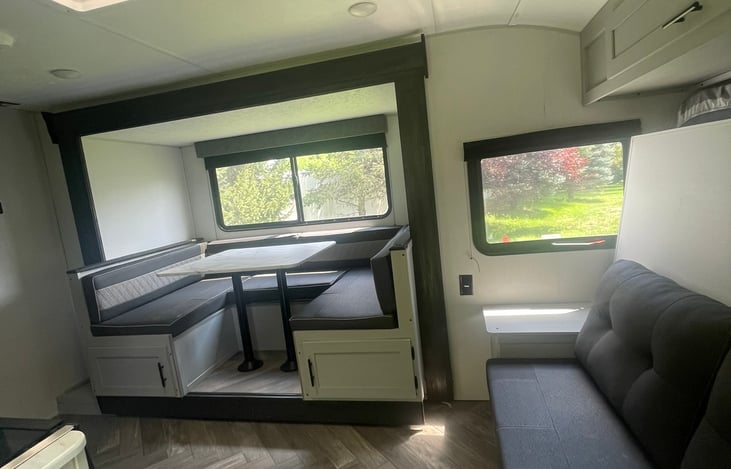 Entrance view, large storage underneath the dinette seats. That's where we keep pots, pans, and other kitchen utensils