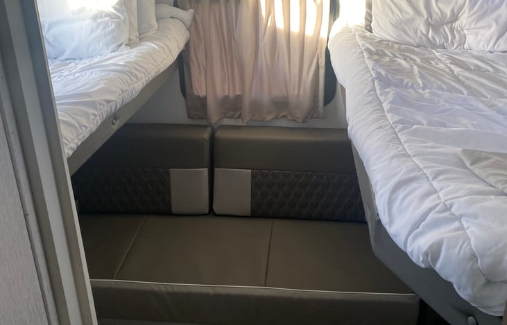 Private Bunkhouse.  2 twin beds, 1 full-size bed, TV and storage.