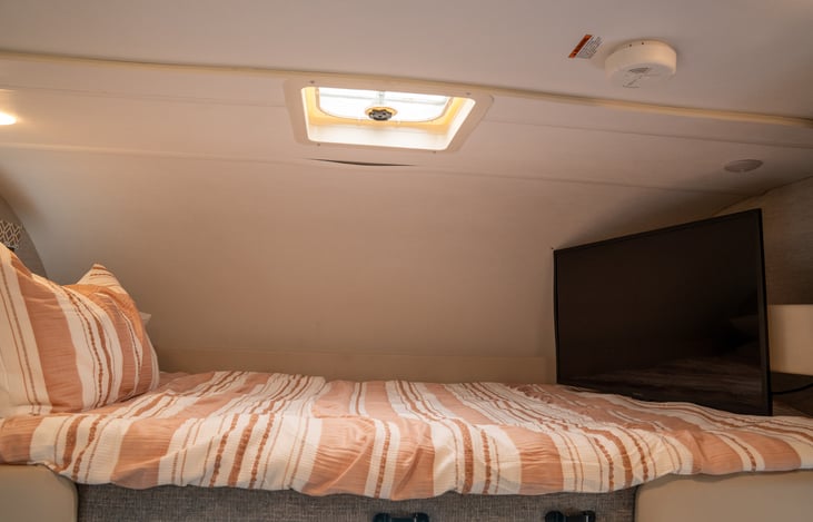 swivel smart TV for easy viewing anywhere in the coach!