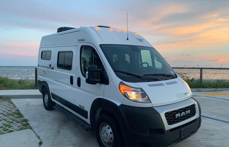 Winnebago Solis Pocket camper van side front view.