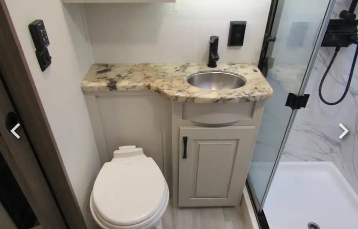 Primary bathroom, shower is tall and spacious!