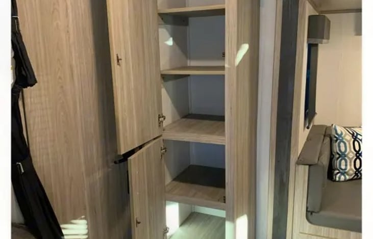 "Smoky Pass" has lots of cabinet space including this pantry.  The kitchen is stocked with pots/pans dishes, cooking tools, toaster, and a coffee maker, so you can enjoy every meal.