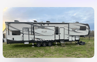 42’ Luxury Toyhauler with rare Side Patio