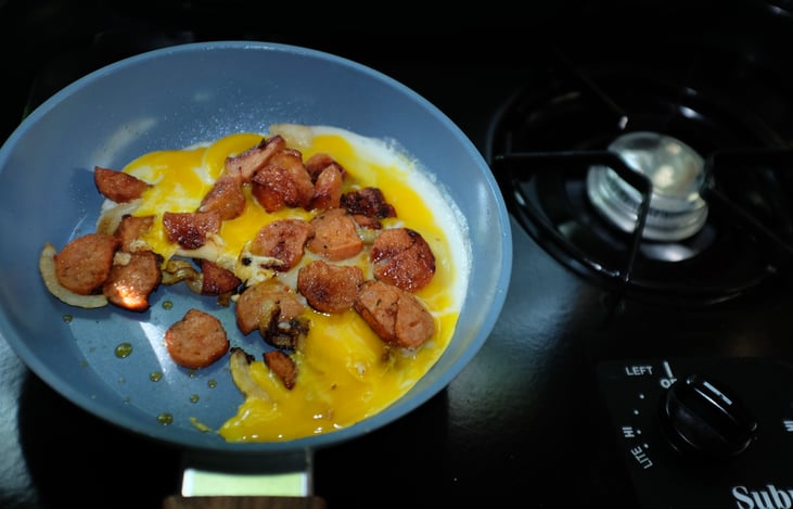 Bfast of chicken sausage and scrambled eggs in the easy use galley stove. All skillets PFAS-Free.