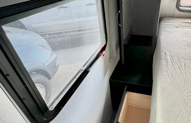 On each side of the bed there is one pull out drawer for your items as well as a hanging closet with ample space.