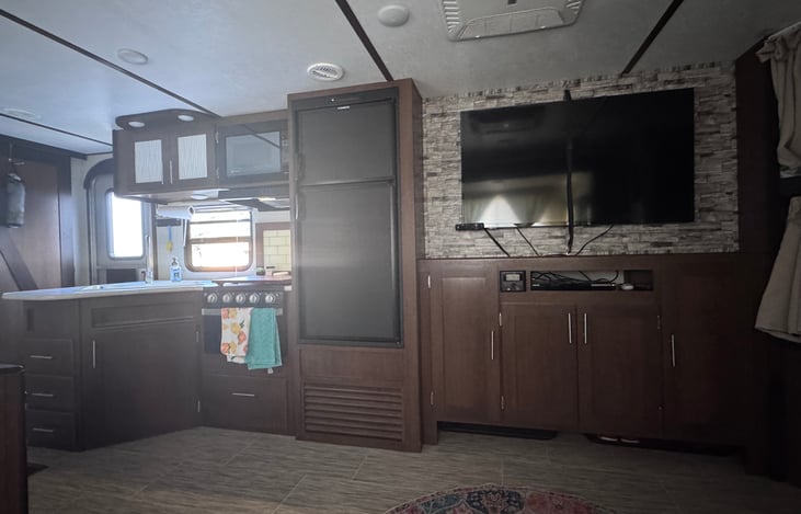 Large smart TV with DVD player.