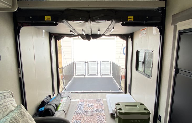 Queen bed and benches both go up to the ceiling