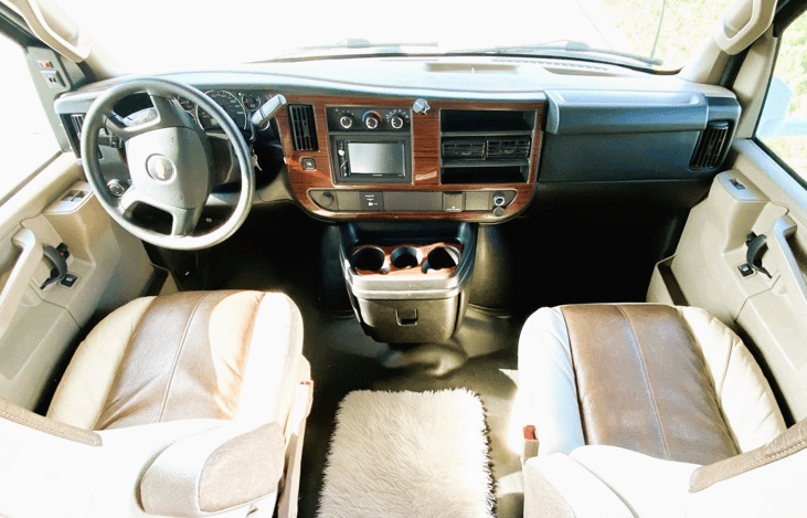 Clean and comfortable RV driving area — hit the road with unlimited mileage included.