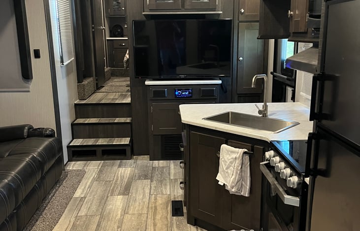 Does have 2 tvs. One in living room and one in garage bedroom