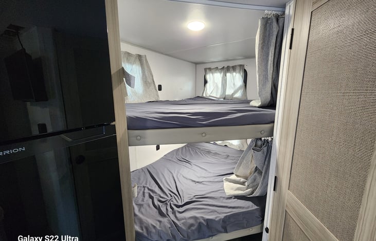 Double bunks. We have a multiple adults in these bunks. The are full size beds! Each bunk has a privacy curtain.