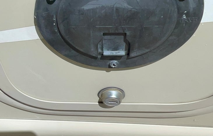 Electric cord in this compartment with every possible adapter inside.