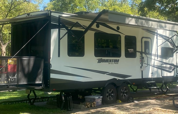 Covered Patio Deck out back for convenient outdoor relaxing with easy access to going inside.