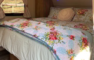 Step back in time in this charming vintage camper!