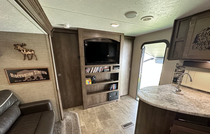 Living space with bedroom doors closed.