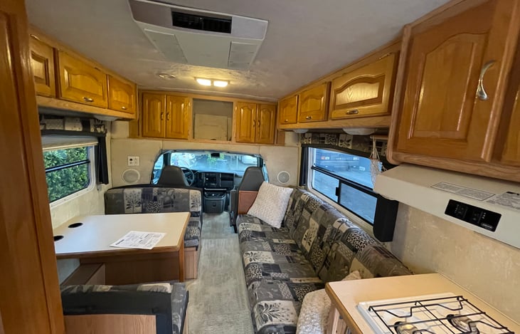 Plenty of overhead cabinets allow for storage for all of your gear during your trip.