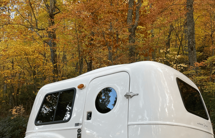 Retro-cool 2022 Happier Camper HC1! Lightweight, versatile, modular interior adapts to any adventure. Sleeps 2+, iconic design. At 1,100 lbs, it's super easy to tow!