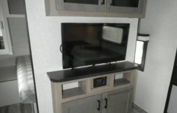 Enter queen size bedroom from either right or left, both sides have sliding door.