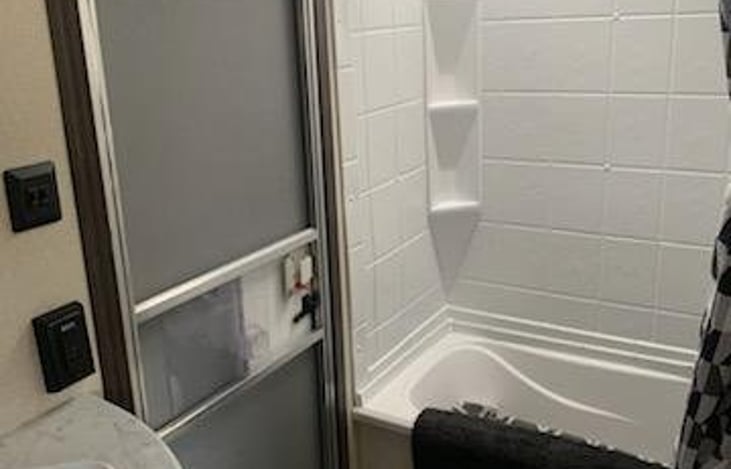Full bathroom with tub/shower combo