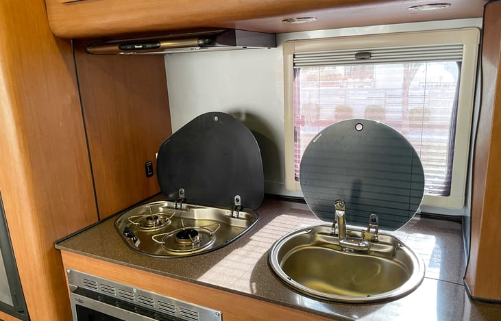 Pop up sink and stove