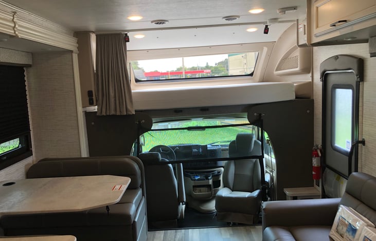 Driver and passenger seats rotate