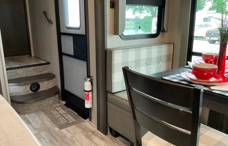 Three stairs lead up to the bathroom door on the left of the landing. The other door leads into the master bedroom.