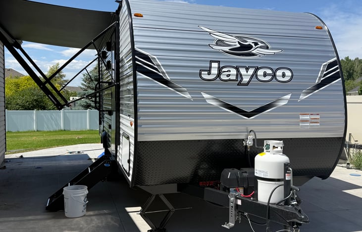 Front view with awning out- free refills for propane at any Bish's RV.