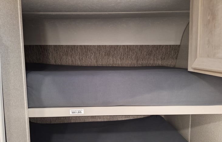 Top Bunk 43x87 Sleeps 2 w fitted sheet and memory
 Bottom Bunk 50x87 Sleeps 2 adults w fitted sheet and memory foam