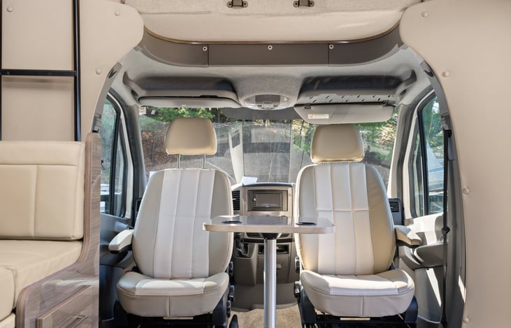 Front captain seats swivel for additional seating