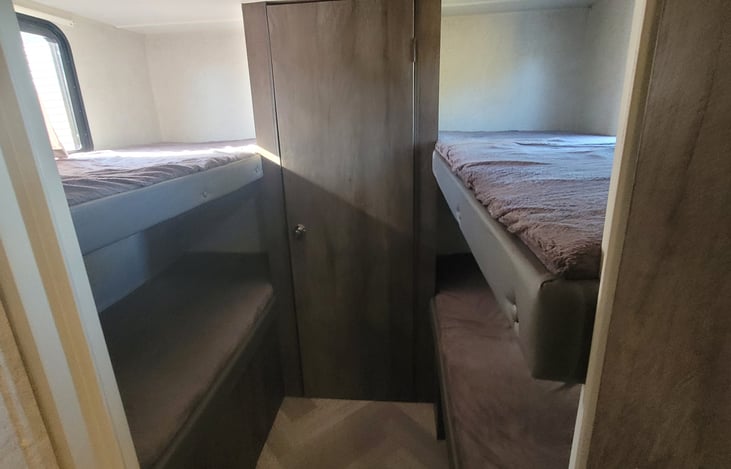 closet includes a clothes bar