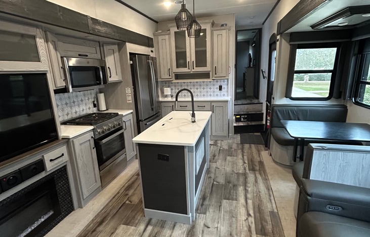 Living room w/ sofa and fireplace