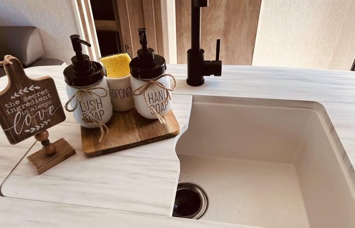 large sink can convert to extra counterspace when needed  by placing the covers over the sink (one side open to show example)