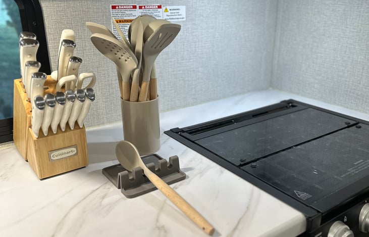 Complete set of kitchen knives and a variety of essential cooking utensils
